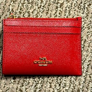Coach crossgrain leather Mini Skinny ID case keeps essentials secure